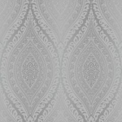 Kismet Moroccan Damask Wallpaper Silver, an intricate mandala-like design in a silver colour repeated throughout the piece of wallpaper.
