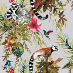 A silver background with various watercolour-style exotic leaves and flowers with hummingbirds flittering throughout the roll. There are lemurs perched on the leaves too.